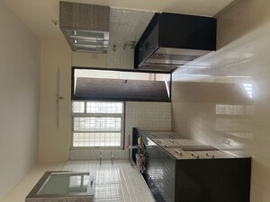 Kitchen in 2 BHK Apartment at Tirupati Kashi Ganga, Dhanori – for Rent
