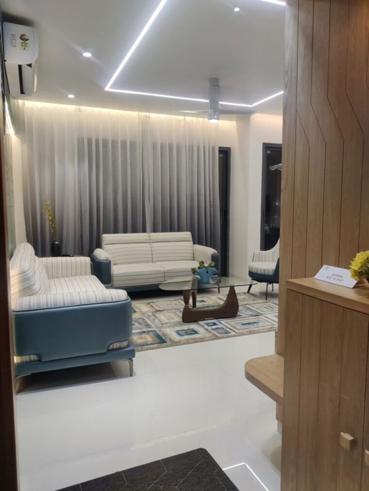 Living Room, everest-axora 3 Bedroom 1272 Sq.Ft. Apartment In Bhayli Vadodara 10633383