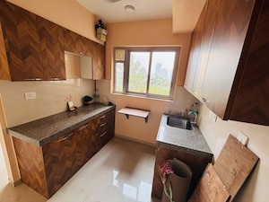 Kitchen in 2 BHK Apartment at Piramal Vaikunth A Class Homes, Balkum Pada – for Rent