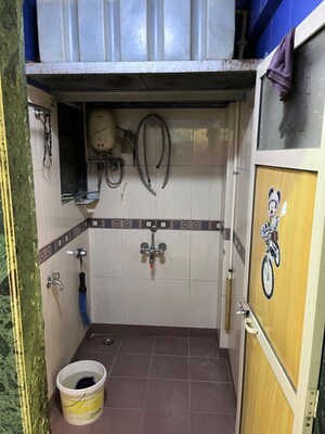 Bathroom in 1.5 BHK Apartment at Yashraj Park CHS, Kasarvadavali – for Rent