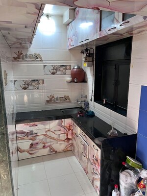 Kitchen in 1.5 BHK Apartment at Yashraj Park CHS, Kasarvadavali – for Rent