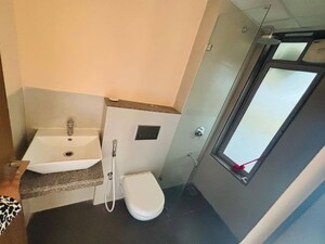 Bathroom in 1 BHK Apartment at Piramal Vaikunth A Class Homes, Balkum Pada – for Rent