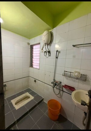 Bathroom in 2 BHK Apartment at Cosmos Regency Kavesar, Kavesar – for Rent
