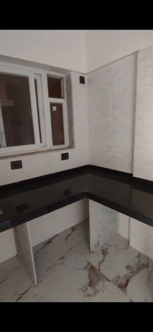 Kitchen in 1 BHK Apartment at Ruparel Crest, Kurla East – for Rent