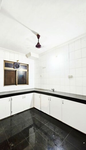 Kitchen in 1 BHK Apartment at Ashoka Tower Andheri, Versova – for Rent