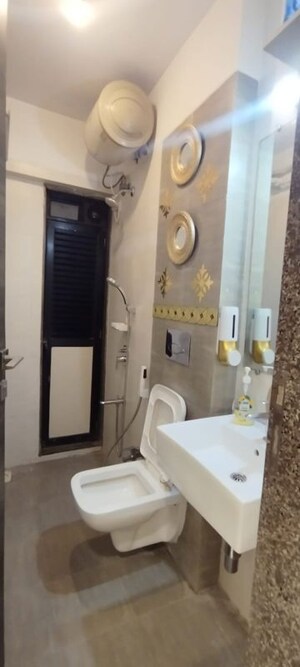 Bathroom in 1 BHK Apartment at Kanakia Rainforest, Andheri East – for Rent