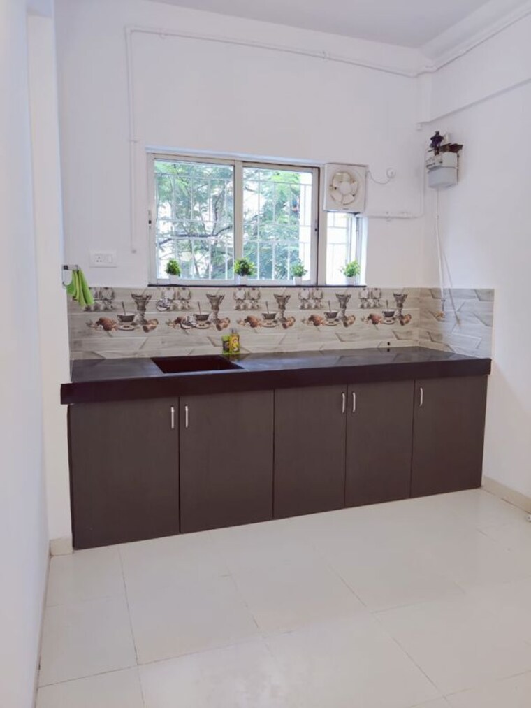 Kitchen, magarpatta-jasminium 2 Bedroom 850 Sq.Ft. Apartment In Hadapsar Pune 10633676