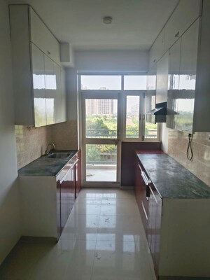 Kitchen in 2 BHK Apartment at Adani Aangan, Sector 89a – for Rent