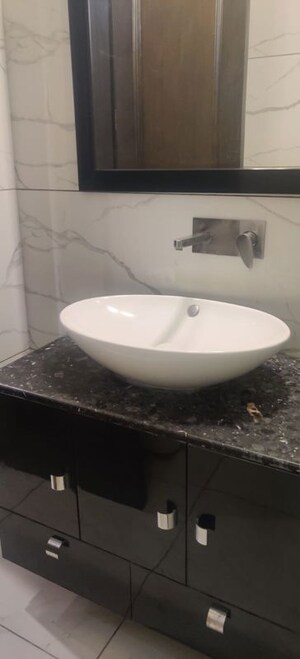 Bathroom in 3 BHK Builder Floor at Defence Colony – for Rent