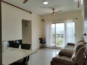 Living Room in 1 BHK Apartment at Paradigm ZENITH, Ghodbunder Road – for Sale