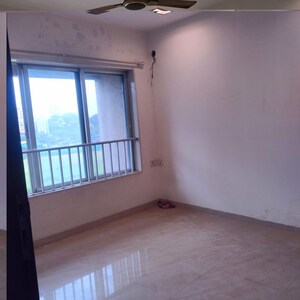 Bedroom in 2 BHK Apartment at Gundecha Symphony, Andheri West – for Sale