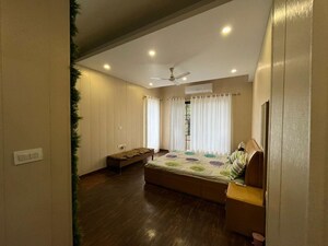 Bedroom in 3 BHK Builder Floor at Ansal API Esencia, Sector 67 – for Rent