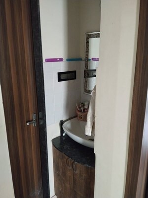 Bathroom in 2 BHK Apartment at Nirman Silver Mist, Lohgaon – for Rent