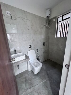 Bathroom in 2 BHK Apartment at Mundara Adhrit Towers, Malad West – for Sale