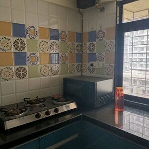Kitchen in 1 BHK Apartment at Rosa Classique, Kasarvadavali – for Sale