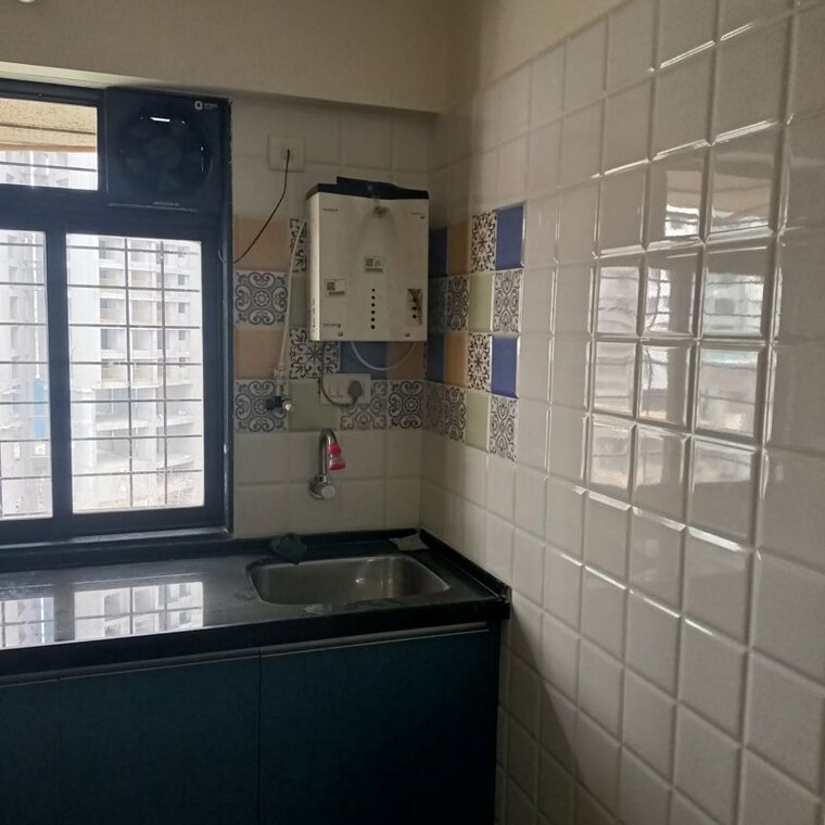 Kitchen, rosa-classique 1 Bedroom 466 Sq.Ft. Apartment In Kasarvadavali Thane 10633894