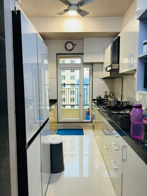 Kitchen in 2 BHK Apartment at Rustomjee Azziano Wing E, Thane West – for Sale