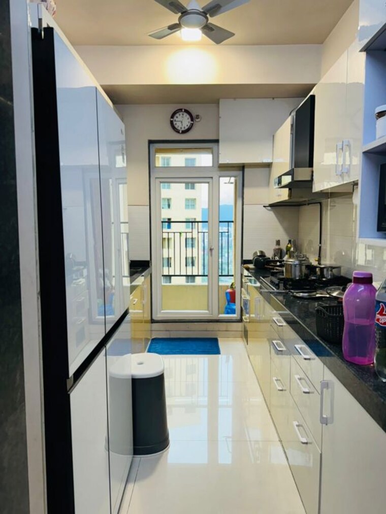 Kitchen, rustomjee-azziano-wing-e 2 Bedroom 828 Sq.Ft. Apartment In Thane West Thane 10633920