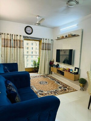 Living Room in 2 BHK Apartment at Rustomjee Azziano Wing E, Thane West – for Sale
