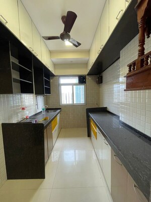 Kitchen in 2 BHK Apartment at Dhoot Sky Residency New Sonali CHSL, Malad West – for Rent