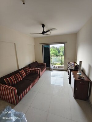 Living Room in 1 BHK Apartment at Goodwill Olive Residency, Owale – for Rent