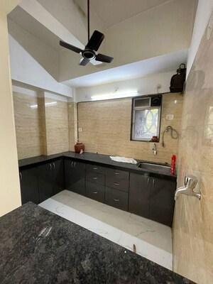 Kitchen in 1.5 BHK Apartment at Sky Crest, Malad West – for Rent