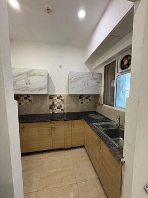Kitchen in 2 BHK Apartment at Gaur City 7th Avenue, Sector 4 Greater Noida – for Rent