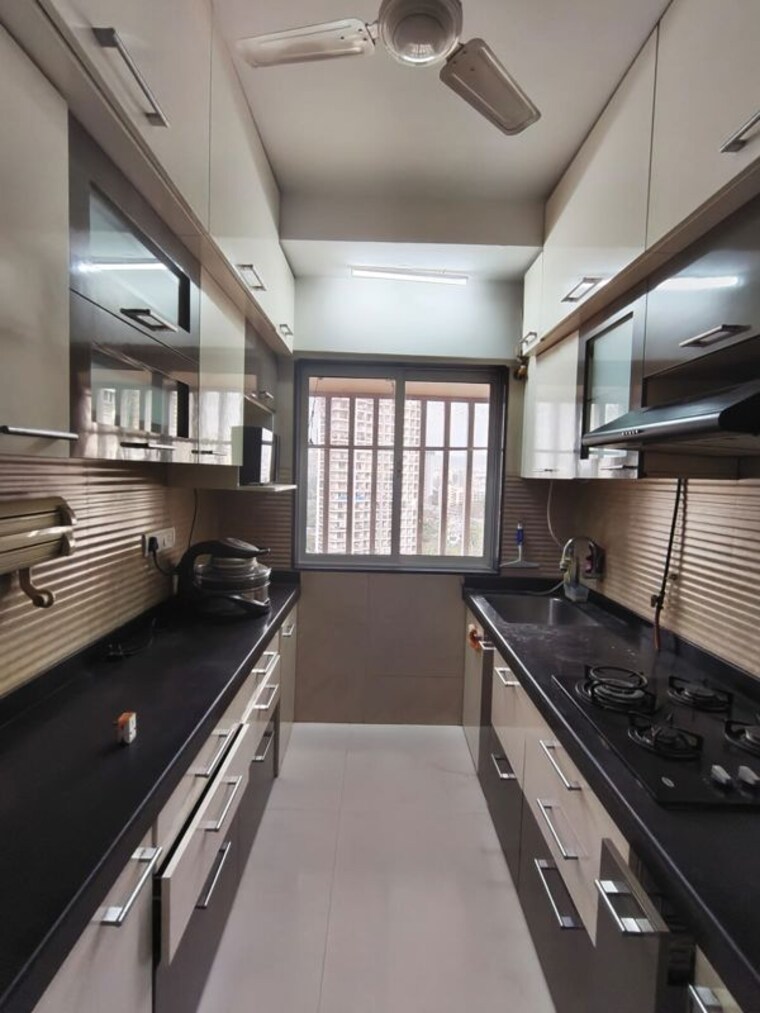 Kitchen, romell-diva 2 Bedroom 550 Sq.Ft. Apartment In Malad West Mumbai 10633992