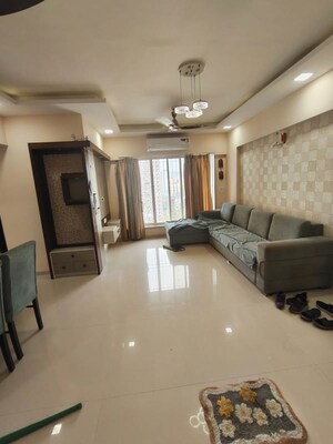 Living Room in 2 BHK Apartment at Romell Diva, Malad West – for Rent