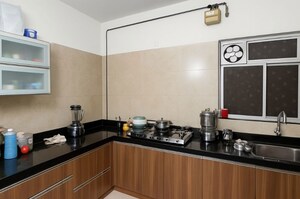 Kitchen in 2 BHK Apartment at Bhandari 7 Plumeria Drive, Tathawade – for Rent
