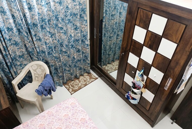 Living Room, bhandari-7-plumeria-drive 2 Bedroom 1100 Sq.Ft. Apartment In Tathawade Pune 10633991