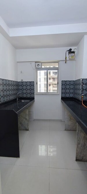 Kitchen in 1 BHK Apartment at Lodha Amara, Kolshet Road – for Rent