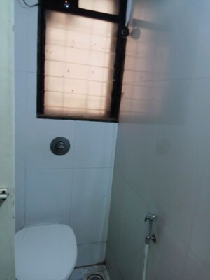 Bathroom in 2 BHK Apartment at Puranik City, Kasarvadavali – for Rent