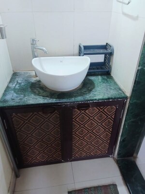 Bathroom in 2 BHK Apartment at Puranik City, Kasarvadavali – for Rent