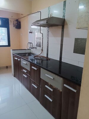 Kitchen in 2 BHK Apartment at Puranik City, Kasarvadavali – for Rent