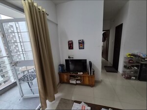Living Room in 1.5 BHK Apartment at TCG Gardenia, Katraj – for Sale