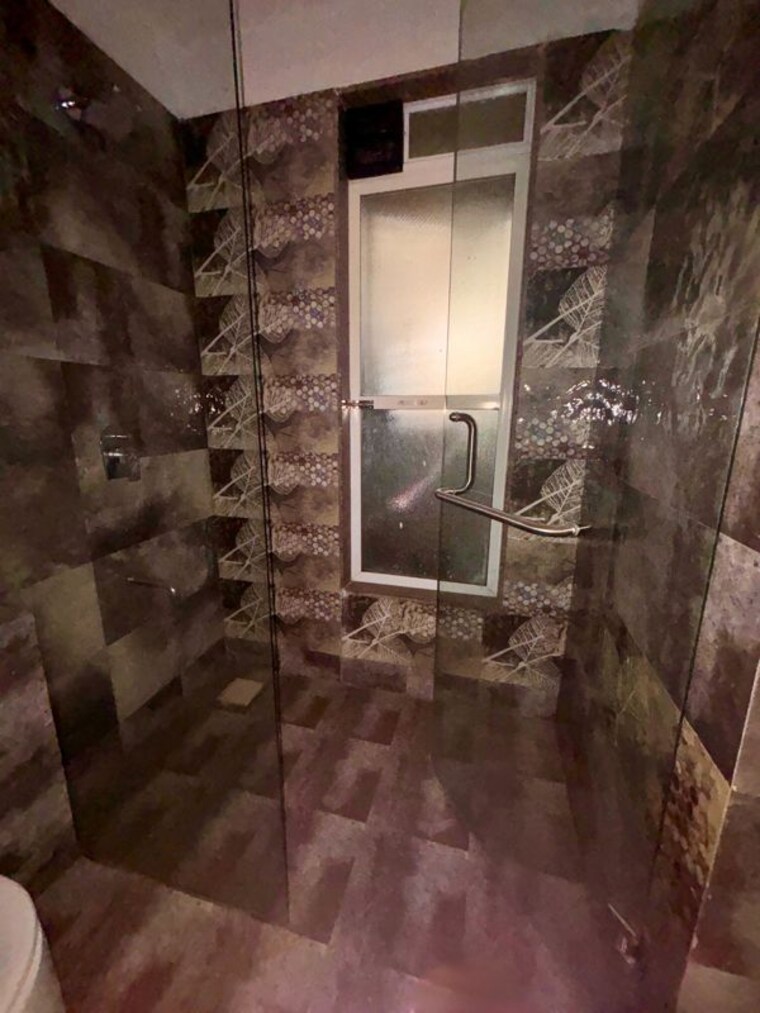 Bathroom, paradise-lifespaces-sai-world-city 3 Bedroom 1600 Sq.Ft. Apartment In New Panvel Navi Mumbai 10634114