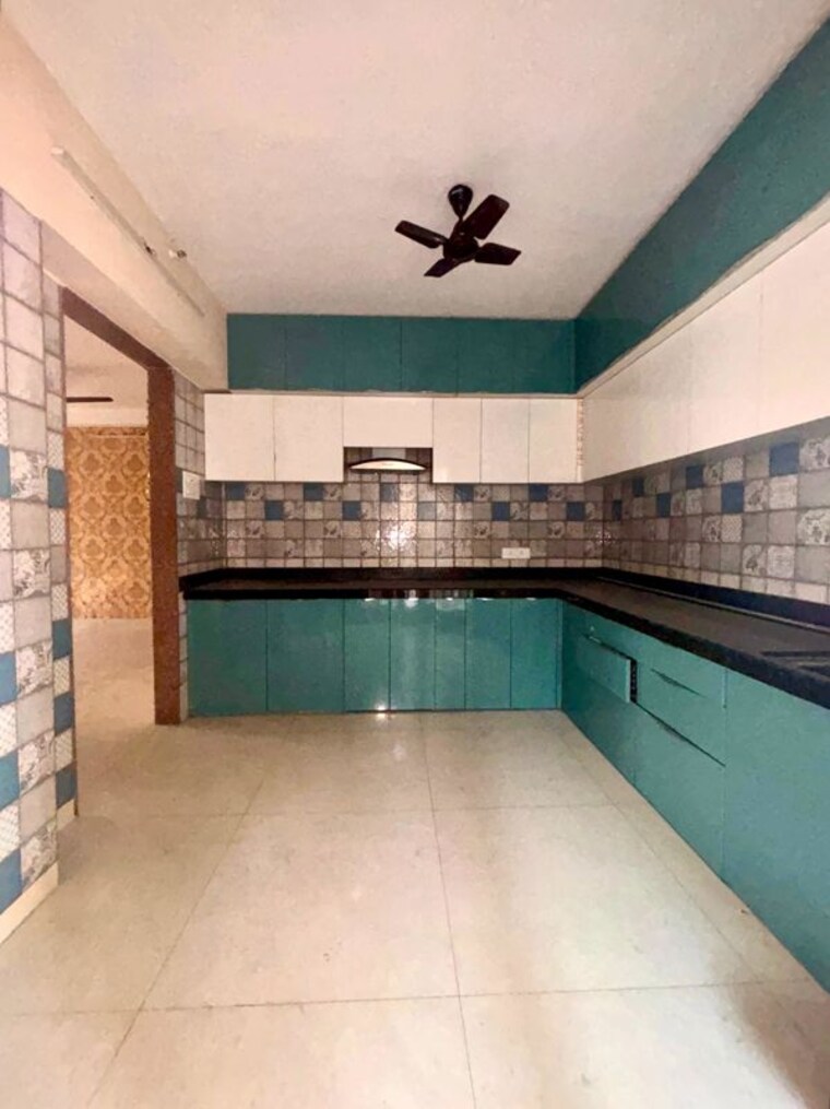 Kitchen, paradise-lifespaces-sai-world-city 3 Bedroom 1600 Sq.Ft. Apartment In New Panvel Navi Mumbai 10634114