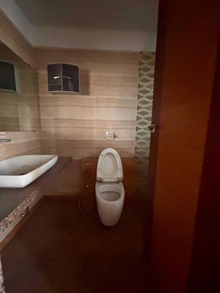 Bathroom, paradise-lifespaces-sai-world-city 3 Bedroom 1600 Sq.Ft. Apartment In New Panvel Navi Mumbai 10634114