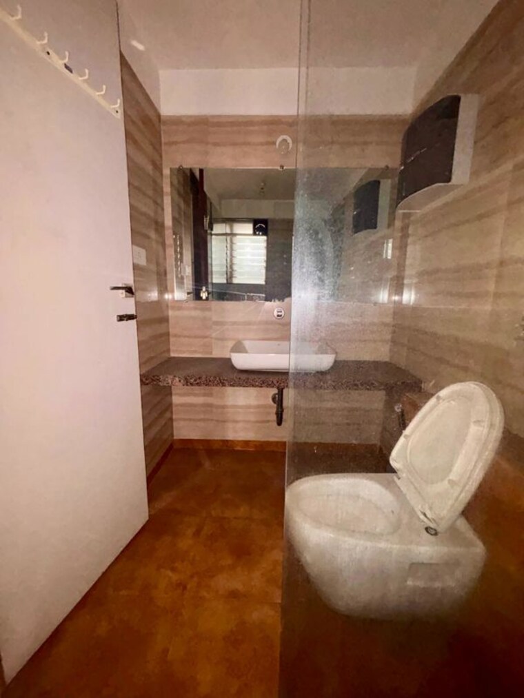 Bathroom, paradise-lifespaces-sai-world-city 3 Bedroom 1600 Sq.Ft. Apartment In New Panvel Navi Mumbai 10634114