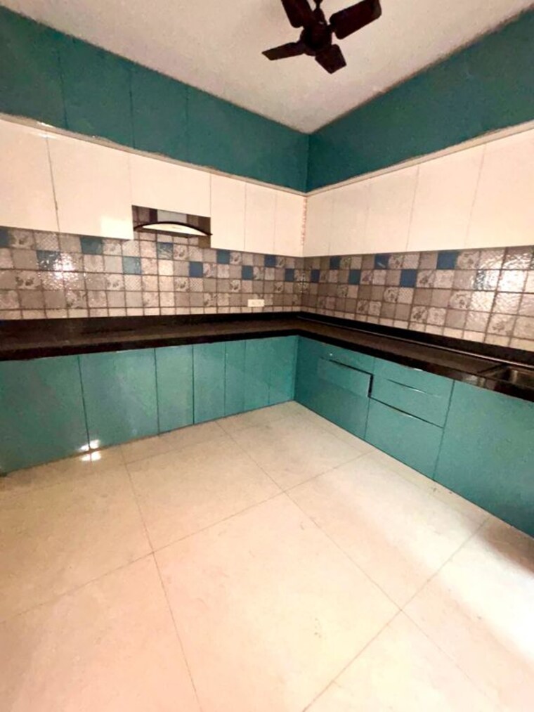 Kitchen, paradise-lifespaces-sai-world-city 3 Bedroom 1600 Sq.Ft. Apartment In New Panvel Navi Mumbai 10634114