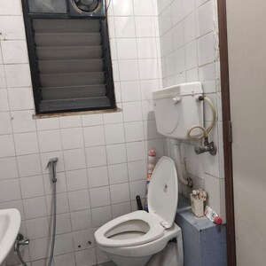 Bathroom in 2 BHK Apartment at Jagdish Nagar CHS, Aundh – for Rent