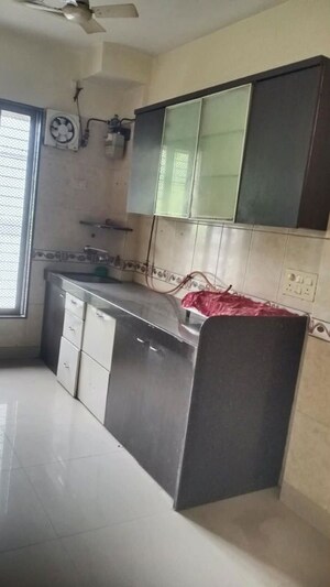 Kitchen in 2 BHK Apartment at Rajanigandha Upvan, Gawand Baug – for Rent