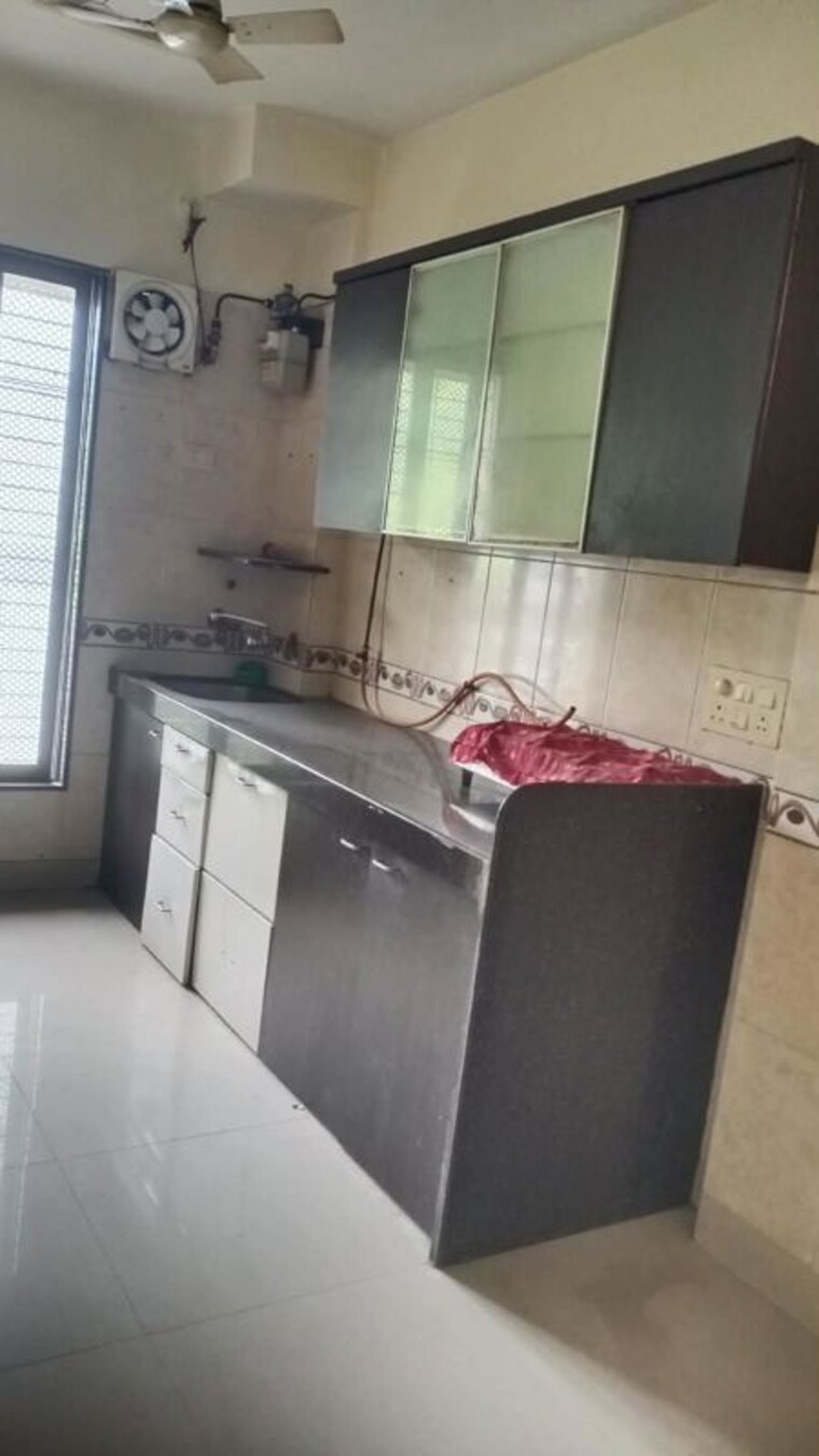 Kitchen, rajanigandha-upvan 2 Bedroom 1050 Sq.Ft. Apartment In Gawand Baug Thane 10634169