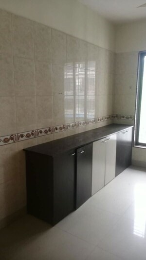 Kitchen in 2 BHK Apartment at Rajanigandha Upvan, Gawand Baug – for Rent