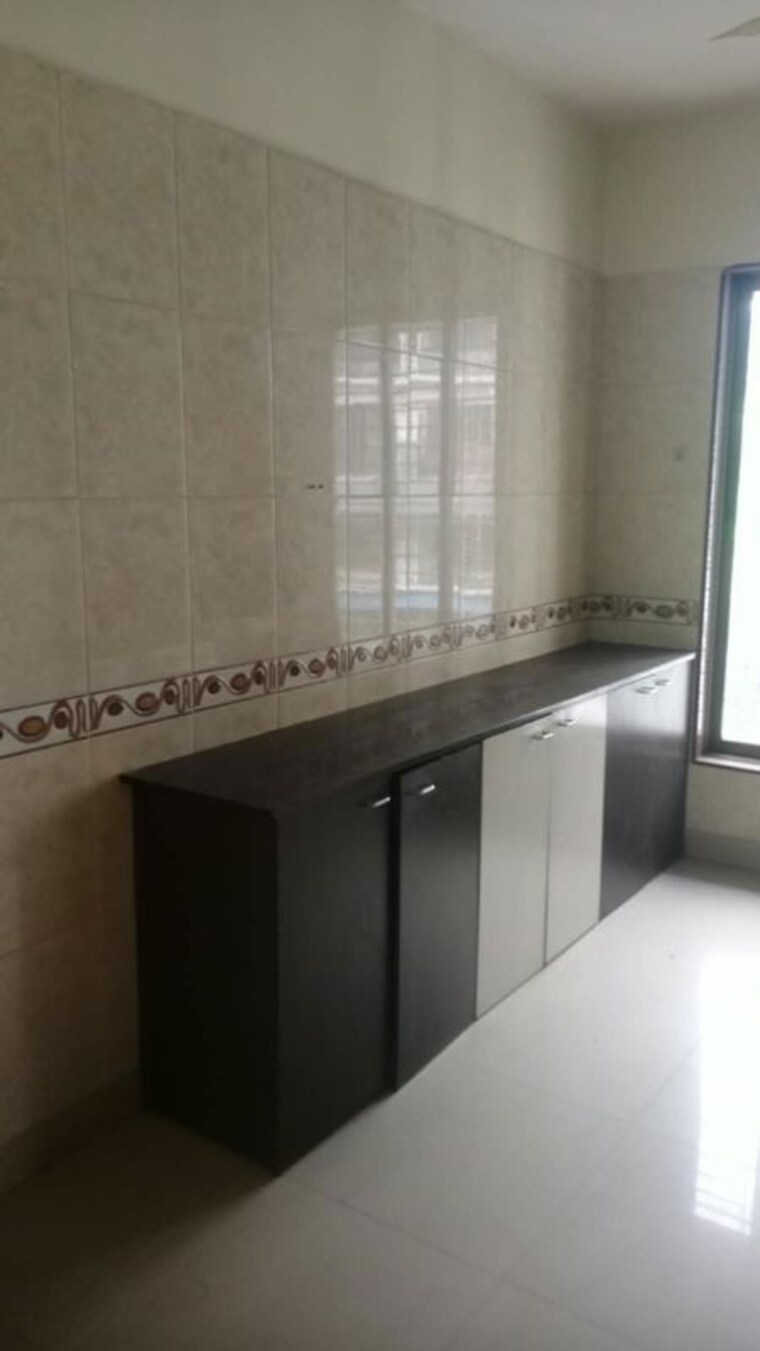 Kitchen, rajanigandha-upvan 2 Bedroom 1050 Sq.Ft. Apartment In Gawand Baug Thane 10634169