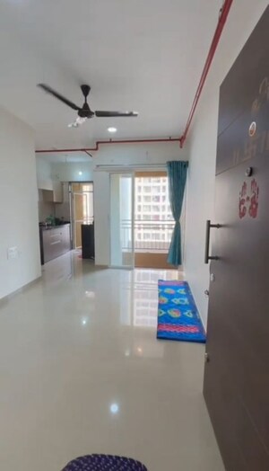 Living Room in 1 BHK Apartment at JP North Aviva, Mira Road – for Rent