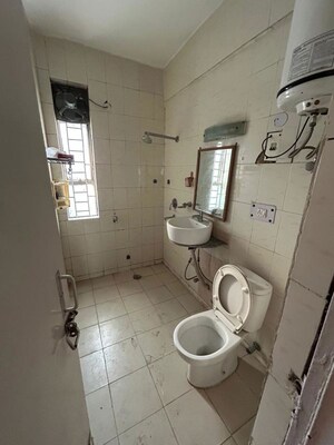 Bathroom in 3 BHK Apartment at Vasant Kunj – for Rent