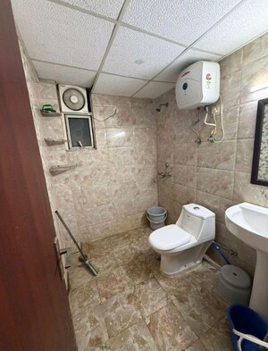 Bathroom in Studio Apartment at Supertech Czar Suites, Omicron I Greater Noida – for Rent