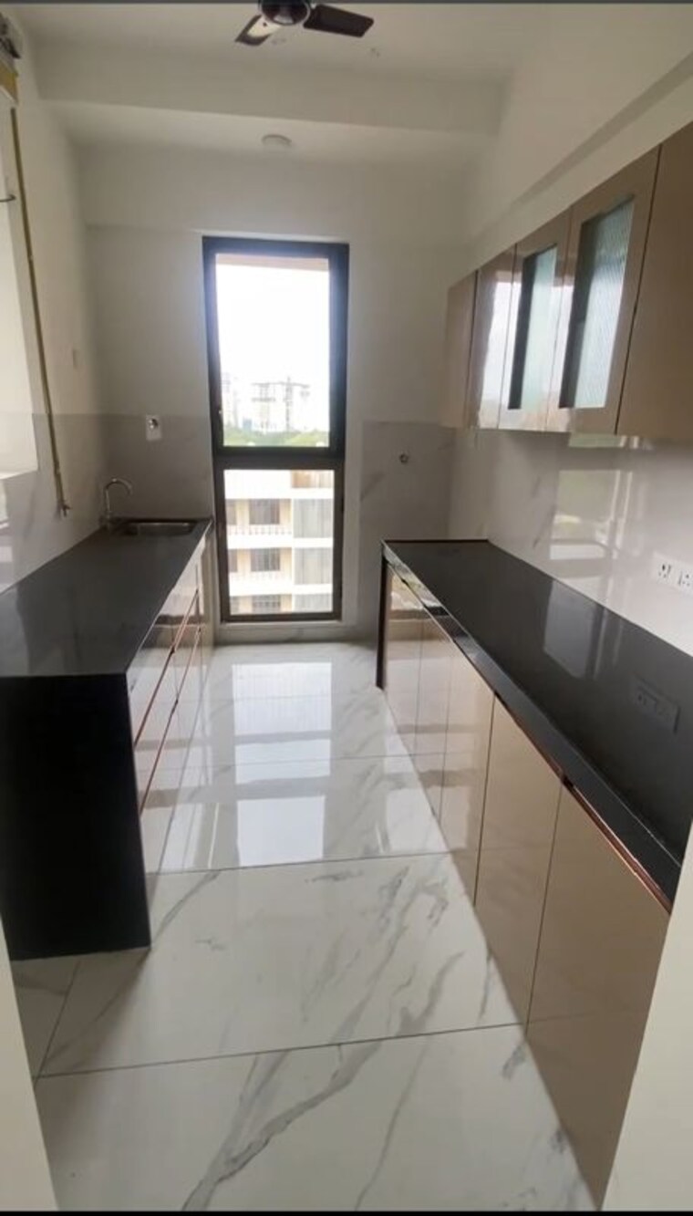 Kitchen, raymond-ten-x-vibes 2 Bedroom 670 Sq.Ft. Apartment In J K Gram Thane 10634278